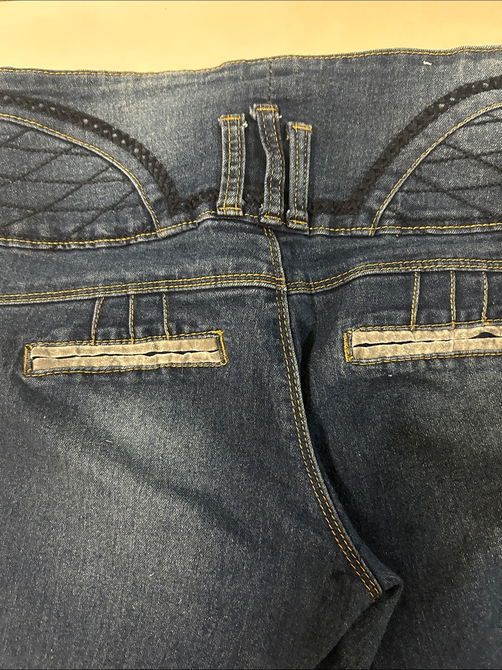 High-Rise Dark Blue Cropped Jeans with Quilted Waist Detail - Picture 9 of 9